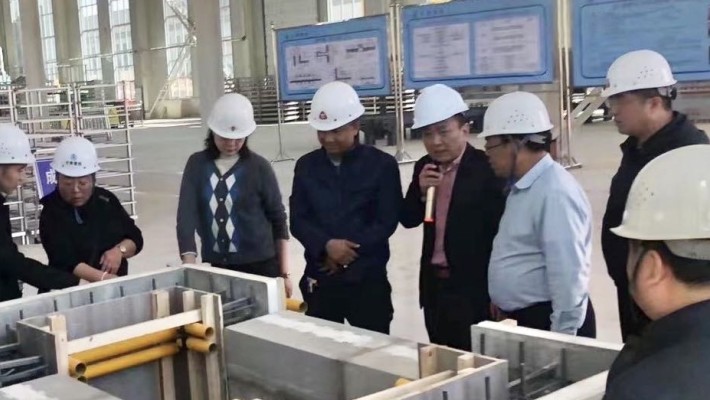 中甘国际国内工程公司一行参观甘肃建投装备公司“免拆复合保温模板项目”